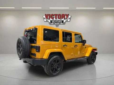 More photos of 2014 Jeep Wrangler Unlimited Sahara 4x4 4dr SUV at Victory Motors Lake Orion, MI