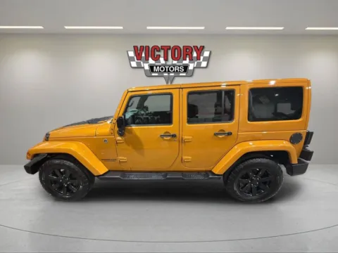 Photos of 2014 Jeep Wrangler Unlimited Sahara 4x4 4dr SUV for sale in Lake Orion, MI at Victory Motors Lake Orion