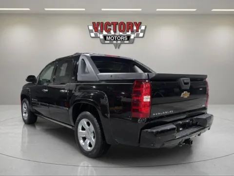 Another view of 2011 Chevrolet Avalanche LTZ 4x4 4dr Crew Cab Pickup for sale in Lake Orion, MI at Victory Motors Lake Orion