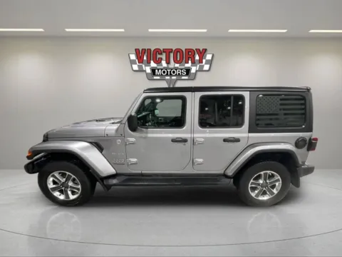 Photos of 2018 Jeep Wrangler Unlimited Sahara 4x4 4dr SUV (midyear release) for sale in Lake Orion, MI at Victory Motors Lake Orion