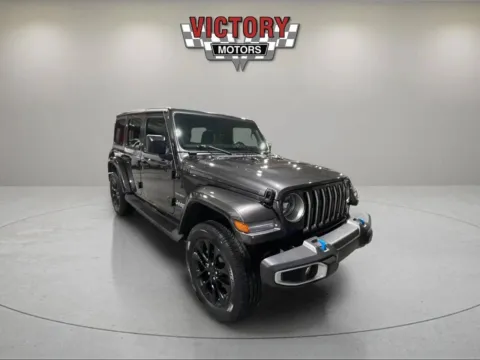 Another view of 2023 Jeep Wrangler Sahara 4xe 4x4 4dr SUV for sale in Lake Orion, MI at Victory Motors Lake Orion