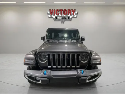 Photos of 2023 Jeep Wrangler Sahara 4xe 4x4 4dr SUV for sale in Lake Orion, MI at Victory Motors Lake Orion