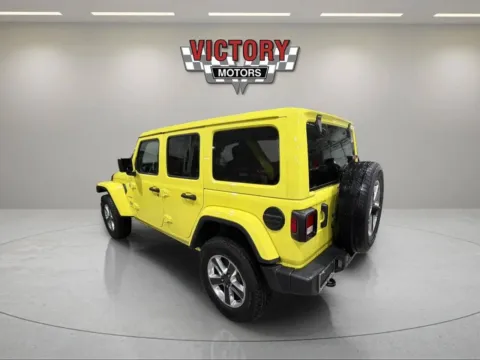 Another view of 2023 Jeep Wrangler Sahara 4x4 4dr SUV for sale in Lake Orion, MI at Victory Motors Lake Orion
