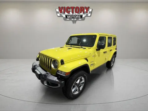 Yellow 2023 Jeep Wrangler Sahara 4x4 4dr SUV for sale in Lake Orion, MI