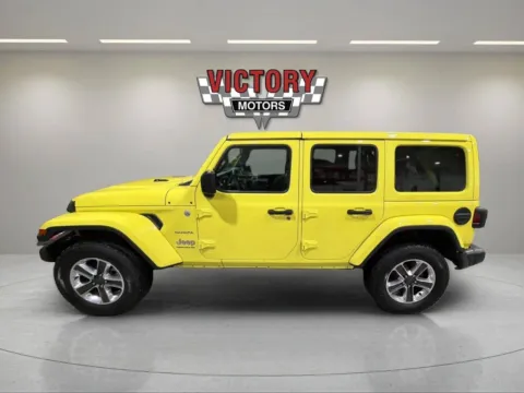 Photos of 2023 Jeep Wrangler Sahara 4x4 4dr SUV for sale in Lake Orion, MI at Victory Motors Lake Orion