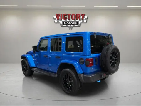Another view of 2022 Jeep Wrangler Unlimited Sahara 4xe 4x4 4dr SUV for sale in Lake Orion, MI at Victory Motors Lake Orion