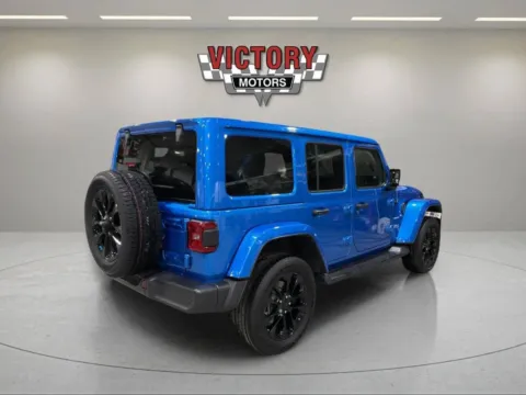 More photos of 2022 Jeep Wrangler Unlimited Sahara 4xe 4x4 4dr SUV at Victory Motors Lake Orion, MI