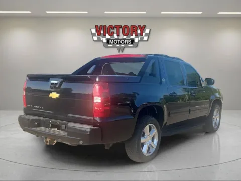 More photos of 2013 Chevrolet Avalanche LS Black Diamond 4x4 4dr Crew Cab Pickup at Victory Motors Lake Orion, MI