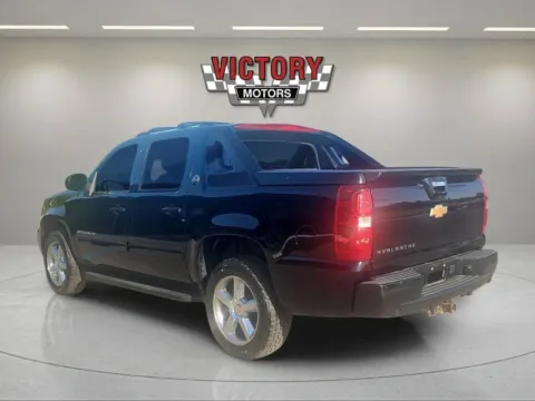 Another view of 2013 Chevrolet Avalanche LS Black Diamond 4x4 4dr Crew Cab Pickup for sale in Lake Orion, MI at Victory Motors Lake Orion