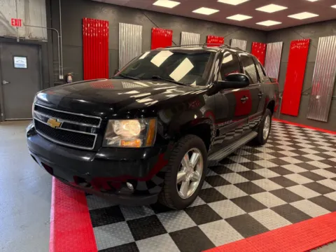 Another view of 2013 Chevrolet Avalanche LS Black Diamond 4x4 4dr Crew Cab Pickup for sale in Lake Orion, MI at Victory Motors Lake Orion