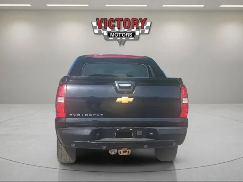 More photos of 2013 Chevrolet Avalanche LS Black Diamond 4x4 4dr Crew Cab Pickup at Victory Motors Lake Orion, MI