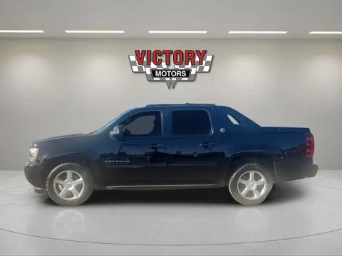 Photos of 2013 Chevrolet Avalanche LS Black Diamond 4x4 4dr Crew Cab Pickup for sale in Lake Orion, MI at Victory Motors Lake Orion