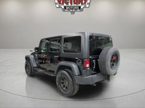 Another view of 2015 Jeep Wrangler Unlimited Sport 4x4 4dr SUV for sale in Lake Orion, MI at Victory Motors Lake Orion