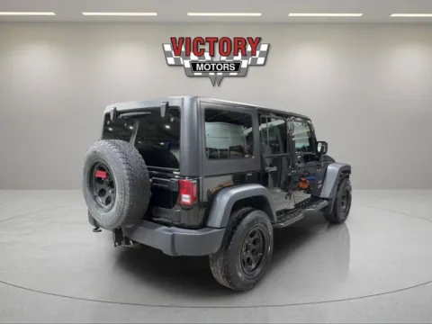 More photos of 2015 Jeep Wrangler Unlimited Sport 4x4 4dr SUV at Victory Motors Lake Orion, MI