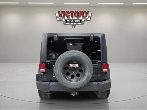 More photos of 2015 Jeep Wrangler Unlimited Sport 4x4 4dr SUV at Victory Motors Lake Orion, MI