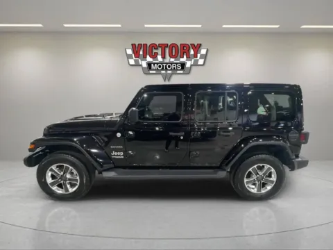 Photos of 2021 Jeep Wrangler Unlimited Sahara 4x4 4dr SUV for sale in Lake Orion, MI at Victory Motors Lake Orion