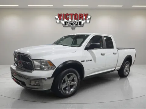 Black 2010 Dodge Ram 1500 SLT 4x4 4dr Quad Cab 6.3 ft. SB Pickup for sale in Lake Orion, MI