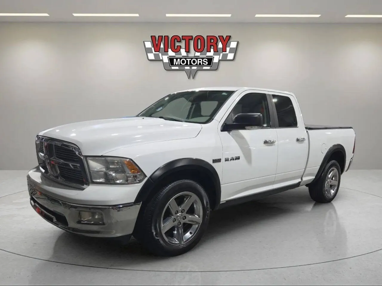 Black 2010 Dodge Ram 1500 SLT 4x4 4dr Quad Cab 6.3 ft. SB Pickup for sale in Lake Orion, MI