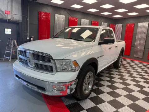 Black 2010 Dodge Ram 1500 SLT 4x4 4dr Quad Cab 6.3 ft. SB Pickup for sale in Lake Orion, MI