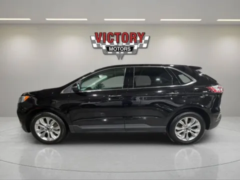 Photos of 2024 Ford Edge Titanium AWD 4dr SUV for sale in Lake Orion, MI at Victory Motors Lake Orion