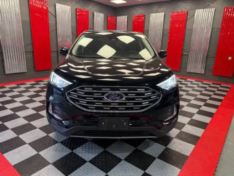 Photos of 2024 Ford Edge Titanium AWD 4dr SUV for sale in Lake Orion, MI at Victory Motors Lake Orion