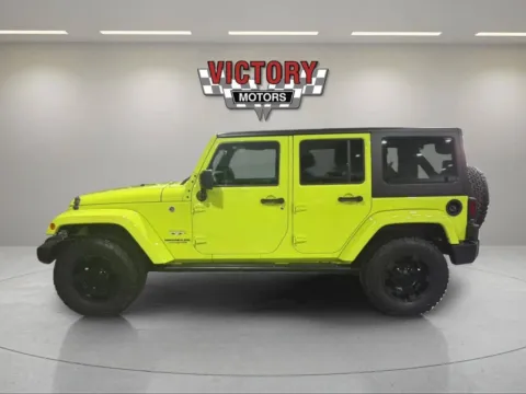 Photos of 2017 Jeep Wrangler Unlimited Sahara 4x4 4dr SUV for sale in Lake Orion, MI at Victory Motors Lake Orion