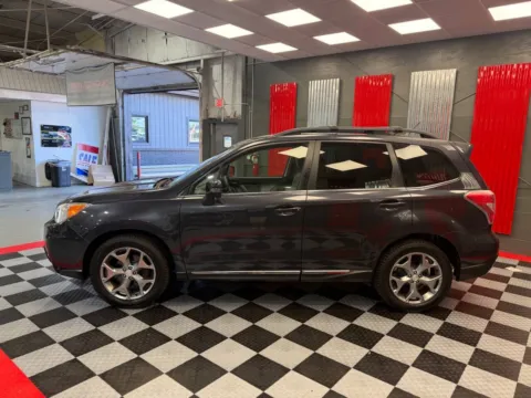 More photos of 2015 Subaru Forester 2.5i Touring AWD 4dr Wagon at Victory Motors Lake Orion, MI