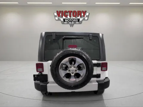 Another view of 2018 Jeep Wrangler JK Unlimited Sahara 4x4 4dr SUV for sale in Lake Orion, MI at Victory Motors Lake Orion