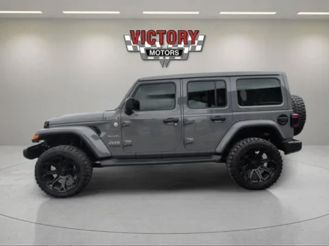 Photos of 2020 Jeep Wrangler Unlimited Sahara 4x4 4dr SUV for sale in Lake Orion, MI at Victory Motors Lake Orion