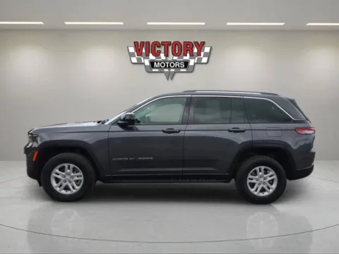 Photos of 2023 Jeep Grand Cherokee Laredo 4x4 4dr SUV for sale in Lake Orion, MI at Victory Motors Lake Orion