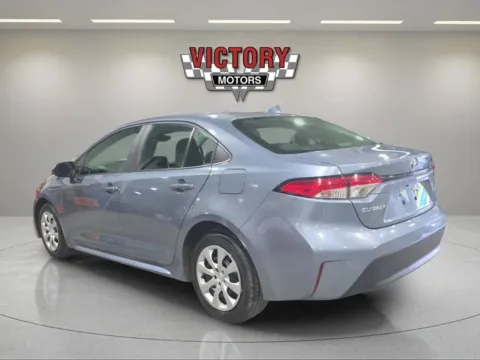 Another view of 2023 Toyota Corolla LE 4dr Sedan for sale in Lake Orion, MI at Victory Motors Lake Orion