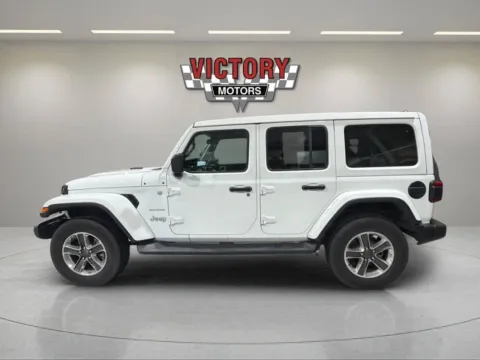 Photos of 2021 Jeep Wrangler Unlimited Sahara 4x4 4dr SUV for sale in Lake Orion, MI at Victory Motors Lake Orion