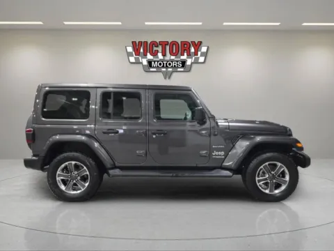 Photos of 2021 Jeep Wrangler Unlimited Sahara 4x4 4dr SUV for sale in Chesterfield, MI at Victory Motors Chesterfield