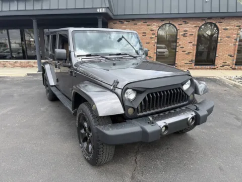 Gray 2016 Jeep Wrangler Unlimited Sahara 4x4 4dr SUV for sale in Chesterfield, MI