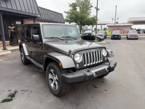 Gray 2016 Jeep Wrangler Unlimited Sahara 4x4 4dr SUV for sale in Chesterfield, MI