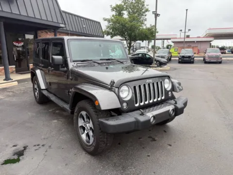 Photos of 2016 Jeep Wrangler Unlimited Sahara 4x4 4dr SUV for sale in Chesterfield, MI at Victory Motors Chesterfield
