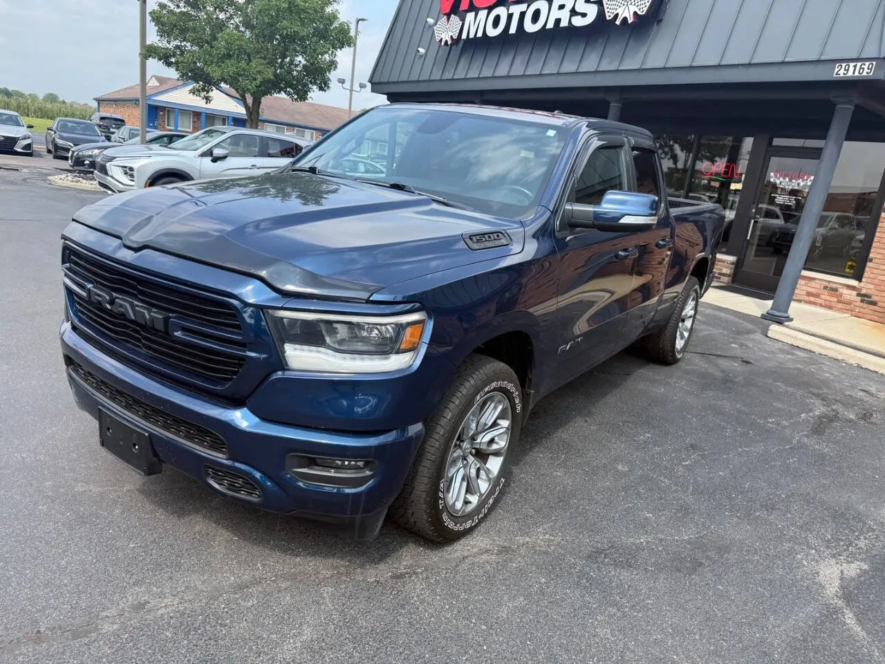 Blue 2019 RAM 1500 Rebel 4x4 4dr Quad Cab 6.4 ft. SB Pickup for sale in Chesterfield, MI