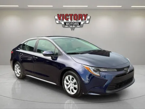 Blue 2024 Toyota Corolla LE 4dr Sedan for sale in Chesterfield, MI