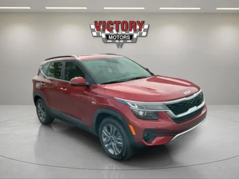 Orange 2023 Kia Seltos S AWD 4dr SUV for sale in Chesterfield, MI