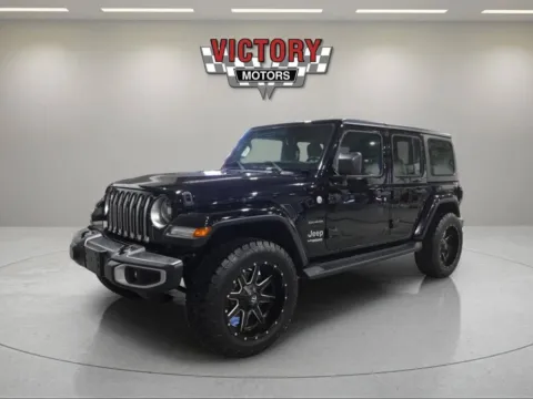 Photos of 2018 Jeep Wrangler Unlimited Sahara 4x4 4dr SUV (midyear release) for sale in Chesterfield, MI at Victory Motors Chesterfield