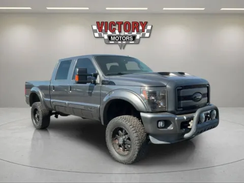 Gray 2016 Ford F-250 Super Duty Lariat 4x4 4dr Crew Cab 8 ft. LB Pickup for sale in Chesterfield, MI
