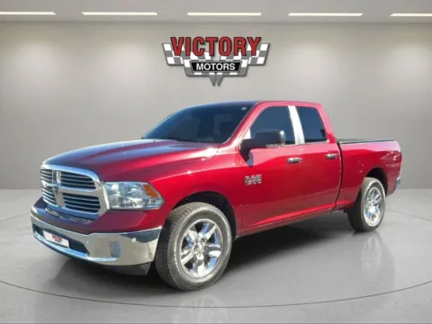 Photos of 2018 RAM 1500 Big Horn 4x4 4dr Quad Cab 6.3 ft. SB Pickup for sale in Chesterfield, MI at Victory Motors Chesterfield