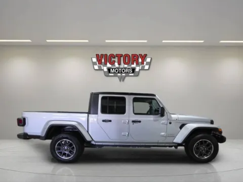 Photos of 2023 Jeep Gladiator Overland 4x4 4dr Crew Cab 5.0 ft. SB for sale in Chesterfield, MI at Victory Motors Chesterfield