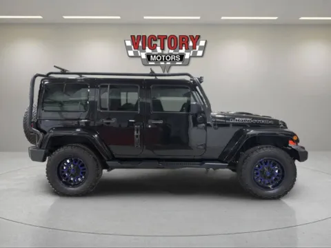 Photos of 2017 Jeep Wrangler Unlimited Sahara 4x4 4dr SUV for sale in Chesterfield, MI at Victory Motors Chesterfield