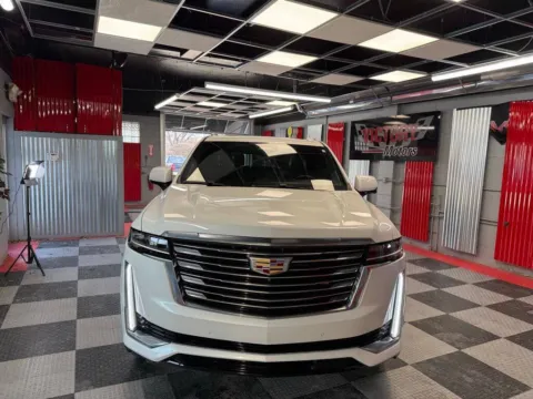 Photos of 2021 Cadillac Escalade Premium Luxury Platinum 4x4 4dr SUV for sale in Royal Oak, MI at Victory Motors Royal Oak