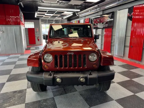 Another view of 2009 Jeep Wrangler Sahara 4x4 2dr SUV for sale in Royal Oak, MI at Victory Motors Royal Oak