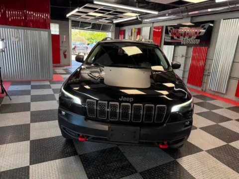 Photos of 2019 Jeep Cherokee Trailhawk 4x4 4dr SUV for sale in Royal Oak, MI at Victory Motors Royal Oak
