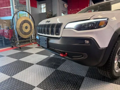 Another view of 2019 Jeep Cherokee Trailhawk 4x4 4dr SUV for sale in Royal Oak, MI at Victory Motors Royal Oak