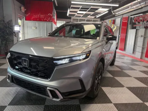 Another view of 2023 Honda CR-V Hybrid Sport Touring AWD 4dr SUV for sale in Royal Oak, MI at Victory Motors Royal Oak