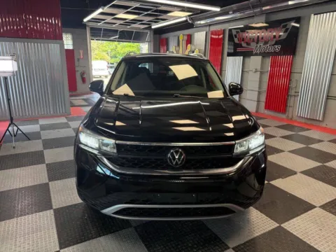 Photos of 2024 Volkswagen Taos SE 4dr SUV for sale in Royal Oak, MI at Victory Motors Royal Oak